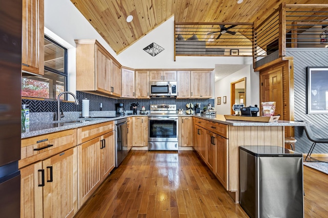 kitchen featuring wooden ceiling, backsplash, sink, wood-type flooring, and stainless steel appliances