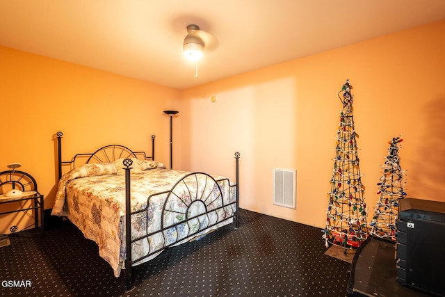 bedroom featuring visible vents and carpet