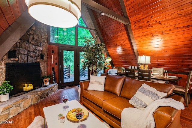 living room featuring wood ceiling, beamed ceiling, hardwood / wood-style flooring, high vaulted ceiling, and wooden walls