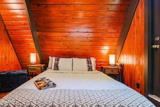 bedroom featuring wooden walls, lofted ceiling, and wood ceiling