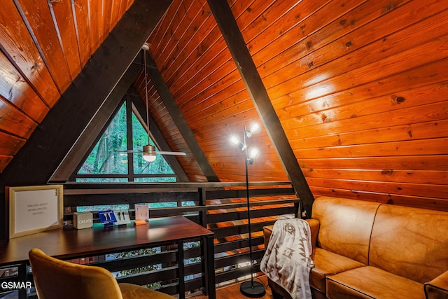 sitting room with vaulted ceiling with beams and wood ceiling