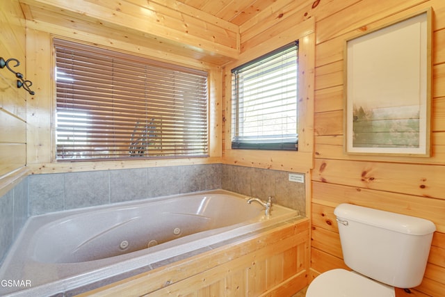 2867 White Oak Ridge Ln, Sevierville, TN 37862 - full bath featuring toilet, a jetted tub, and wooden walls