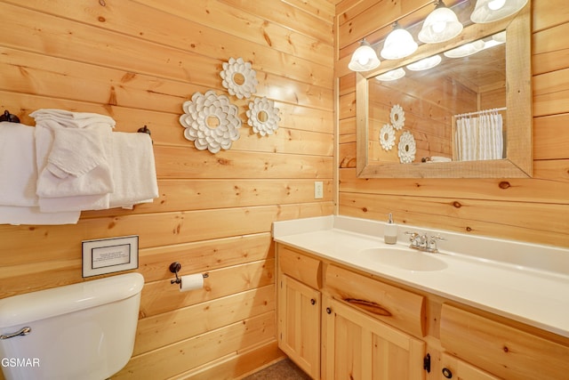 2867 White Oak Ridge Ln, Sevierville, TN 37862 - bathroom with wooden walls, toilet, vanity, and curtained shower