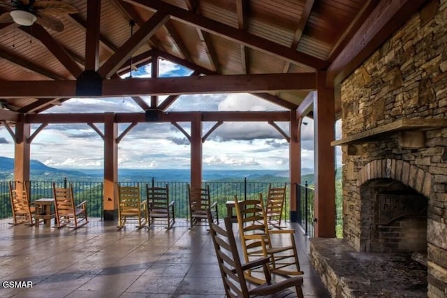 2867 White Oak Ridge Ln, Sevierville, TN 37862 - view of patio / terrace with a gazebo, a mountain view, an outdoor stone fireplace, and ceiling fan