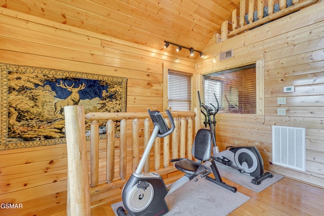 2867 White Oak Ridge Ln, Sevierville, TN 37862 - exercise room featuring vaulted ceiling, wooden walls, rail lighting, hardwood / wood-style flooring, and wood ceiling