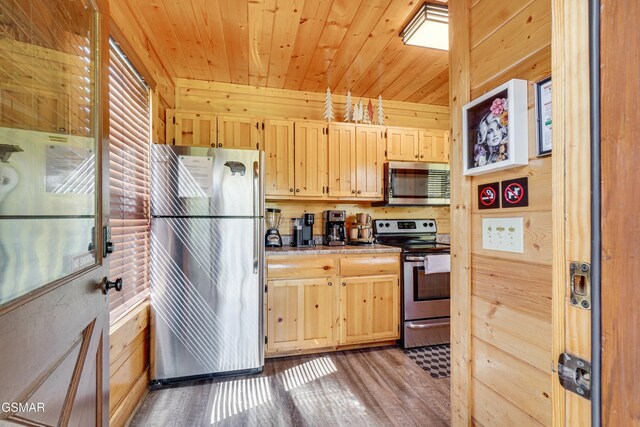 2867 White Oak Ridge Ln, Sevierville, TN 37862 - kitchen featuring stainless steel appliances, light brown cabinets, wood finished floors, wood ceiling, and wood walls
