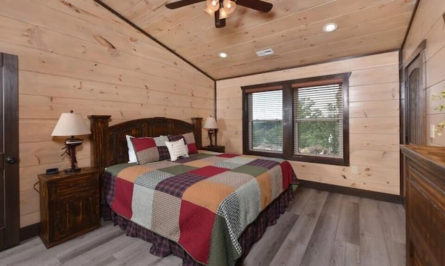 bedroom featuring wood walls, recessed lighting, wood finished floors, lofted ceiling, and wood ceiling