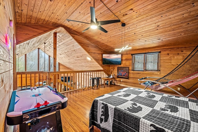 bedroom featuring high vaulted ceiling, hardwood / wood-style floors, wood walls, and wood ceiling