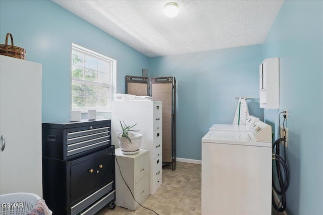 1381 Lake Front Dr, Dandridge, TN 37725 - laundry room with washing machine and dryer and a textured ceiling