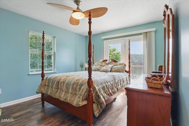 1381 Lake Front Dr, Dandridge, TN 37725 - bedroom featuring access to exterior, dark wood finished floors, baseboards, a textured ceiling, and a ceiling fan