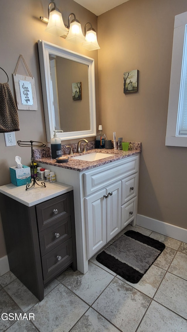 bathroom featuring tile patterned floors and vanity