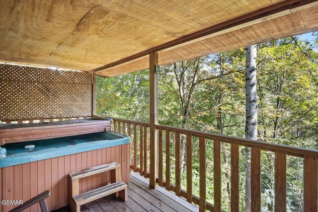 deck with a hot tub