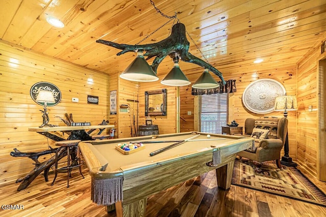 rec room featuring pool table, wood walls, wood ceiling, and hardwood / wood-style floors