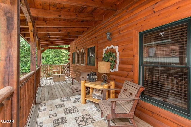 wooden terrace featuring a porch