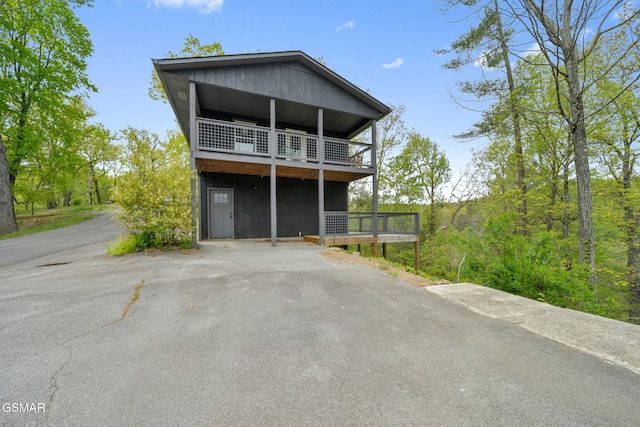 view of front of home with a balcony