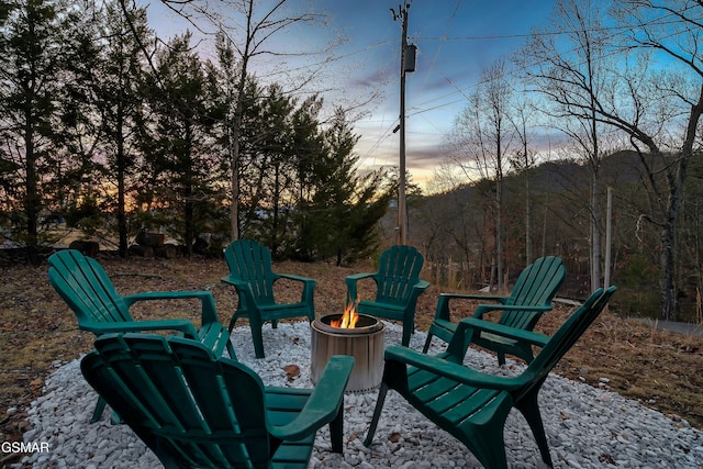 view of patio / terrace featuring a fire pit