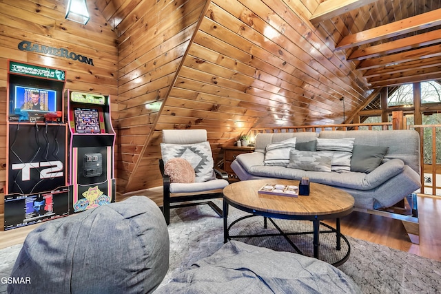 living area featuring wooden ceiling, vaulted ceiling, wood finished floors, and wooden walls
