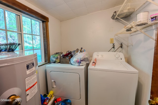 250 Cartertown Rd, Gatlinburg, TN 37738 - clothes washing area featuring separate washer and dryer, electric water heater, and laundry area