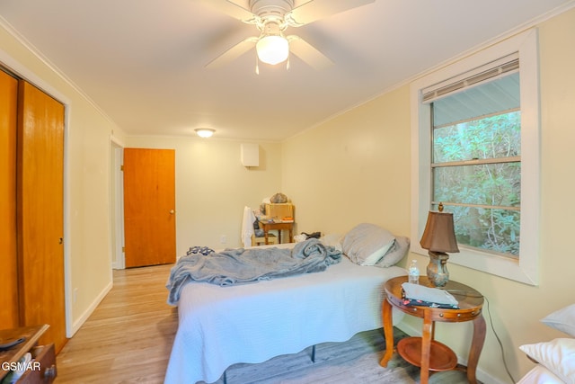 250 Cartertown Rd, Gatlinburg, TN 37738 - bedroom with a ceiling fan, baseboards, ornamental molding, and light wood-type flooring