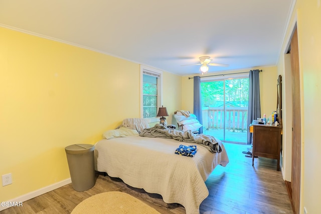 250 Cartertown Rd, Gatlinburg, TN 37738 - bedroom with wood finished floors, a ceiling fan, ornamental molding, baseboards, and access to outside