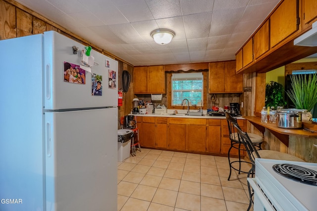 250 Cartertown Rd, Gatlinburg, TN 37738 - kitchen featuring brown cabinets, a sink, white appliances, and light countertops