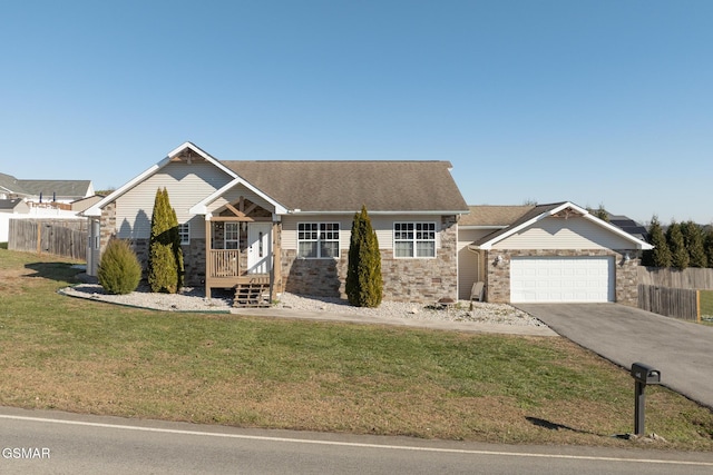 view of front facade with a front lawn and a garage