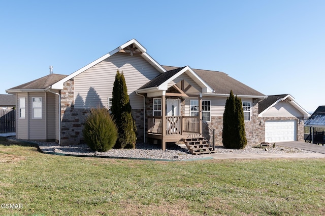 view of front facade featuring a garage and a front lawn