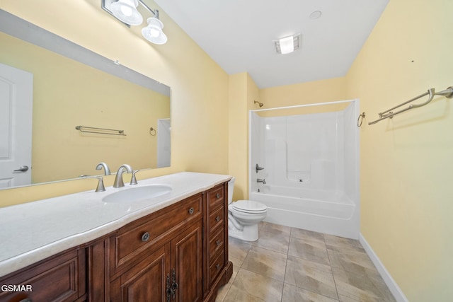 full bathroom with tile patterned floors, vanity, shower / bath combination, and toilet