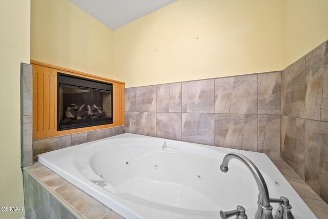 bathroom featuring tiled bath