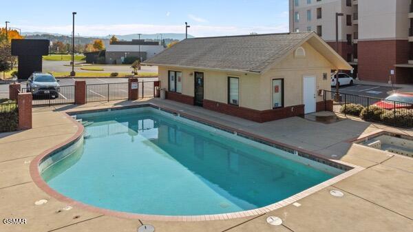 view of swimming pool featuring a patio