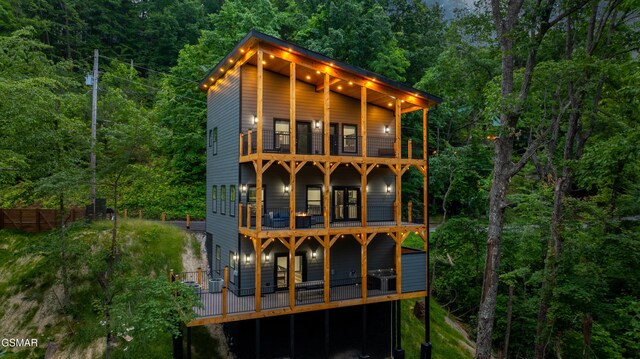 1349 N Baden Dr, Gatlinburg, TN 37738 - rear view of house featuring a balcony and central AC unit