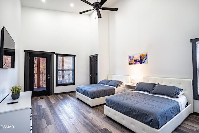 1349 N Baden Dr, Gatlinburg, TN 37738 - bedroom featuring wood finished floors, access to exterior, recessed lighting, a towering ceiling, and ceiling fan