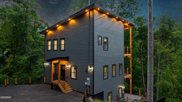 1349 N Baden Dr, Gatlinburg, TN 37738 - rear view of house featuring a balcony and central AC unit