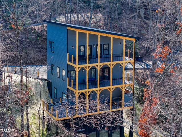 1349 N Baden Dr, Gatlinburg, TN 37738 - view of side of property featuring a balcony and central AC unit