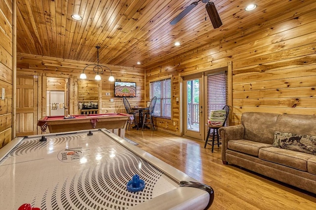 playroom featuring ceiling fan, wooden ceiling, light hardwood / wood-style flooring, wooden walls, and pool table