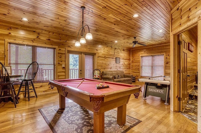 recreation room featuring ceiling fan, wooden ceiling, billiards, wooden walls, and light wood-type flooring