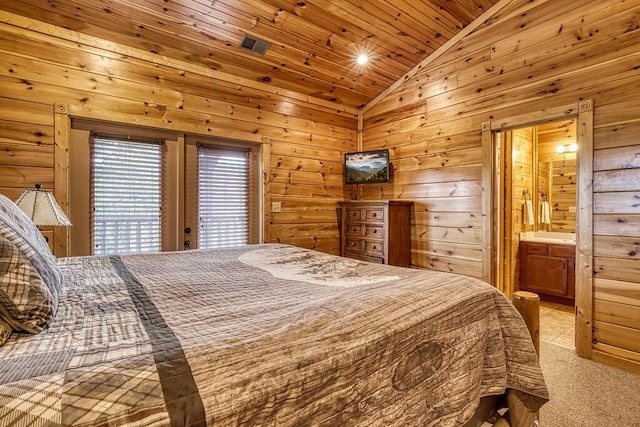 bedroom featuring ensuite bathroom, light colored carpet, vaulted ceiling, wooden ceiling, and wood walls