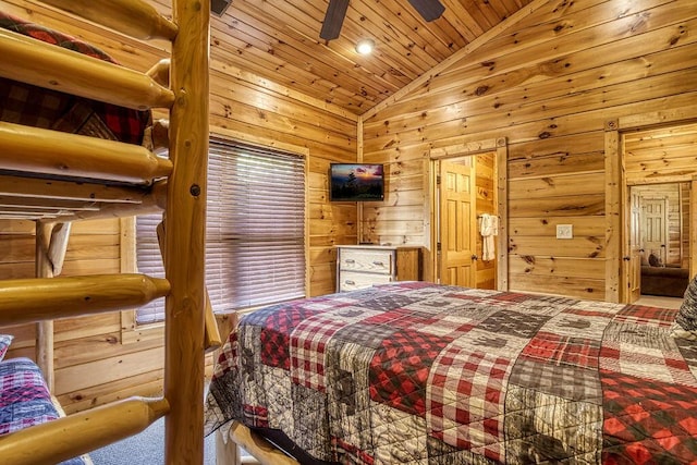 bedroom with ceiling fan, wood ceiling, wooden walls, and vaulted ceiling