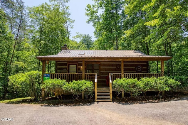 view of log-style house