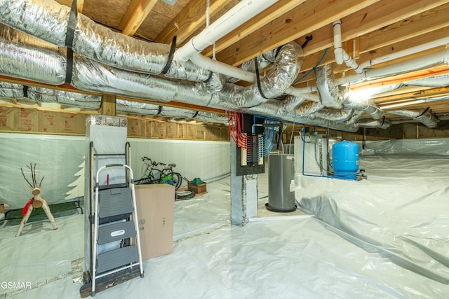 basement with water heater and crawl space