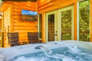 937 Pine Valley Way, Sevierville, TN 37862 - view of patio featuring a hot tub