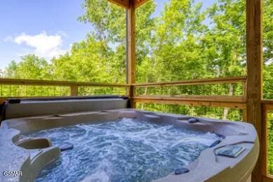 937 Pine Valley Way, Sevierville, TN 37862 - sunroom / solarium featuring a jacuzzi