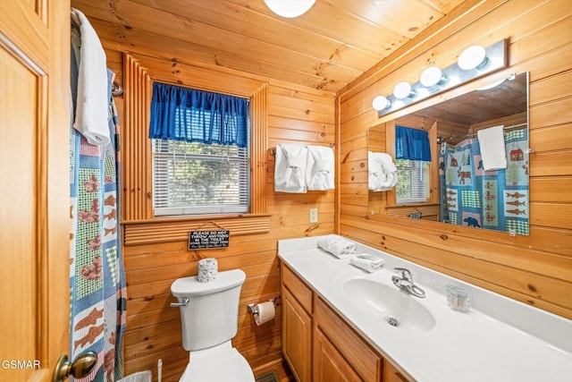 bathroom featuring wooden walls, vanity, toilet, wooden ceiling, and a shower with shower curtain