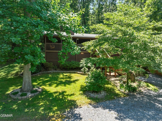 view of yard with a wooden deck