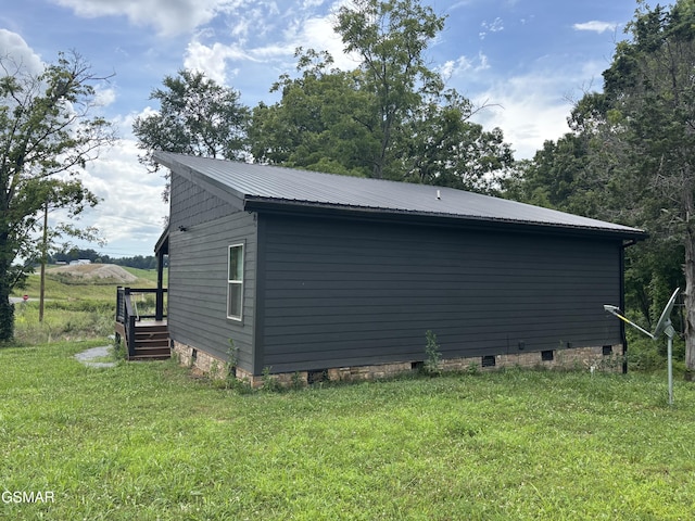 3412 Worth Rd, Sevierville, TN 37876 - view of home's exterior with crawl space, a lawn, and a metal roof