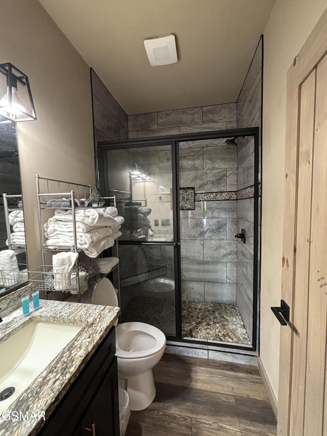 3412 Worth Rd, Sevierville, TN 37876 - full bathroom featuring vanity, wood finished floors, and a shower stall