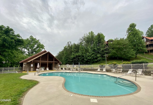 view of pool featuring a patio area