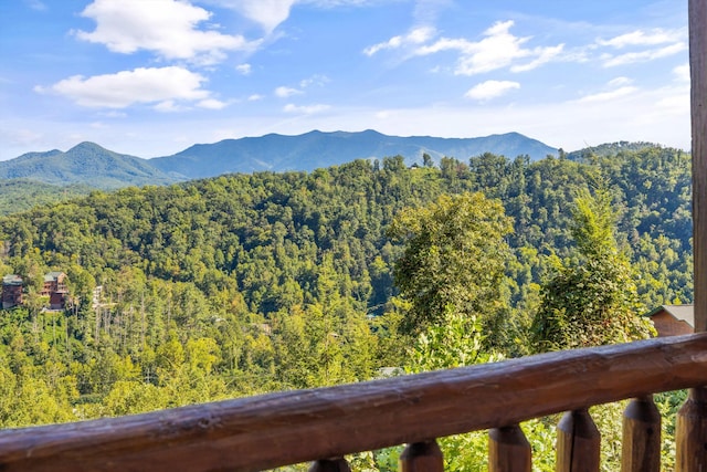 view of mountain feature with a view of trees