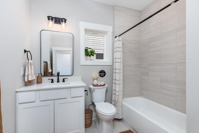 full bathroom featuring toilet, vanity, and shower / tub combo