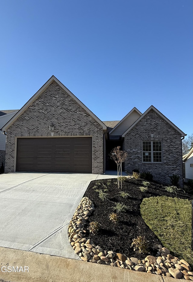 ranch-style house featuring a garage